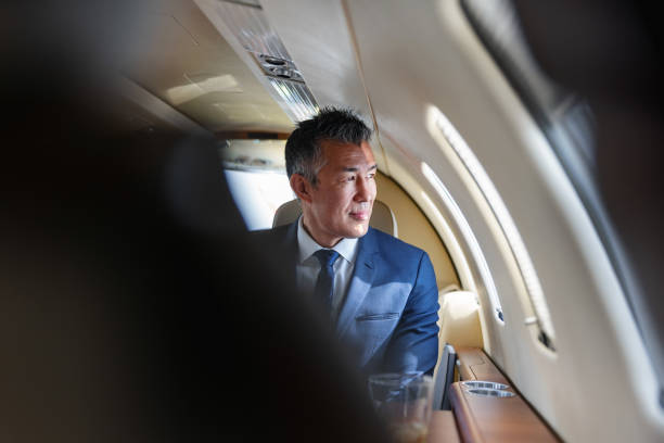 istock Executive Man Contemplating in Luxury Private Jet 2193342318