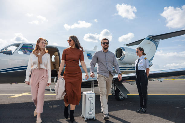 istock Family and Pilot Disembarking from a Private Jet 2193342335