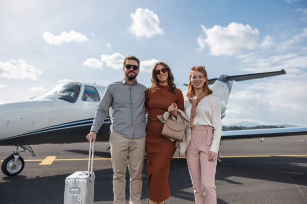 istock Affluent Family Disembarking From Private Jet After Vacation 2193342337