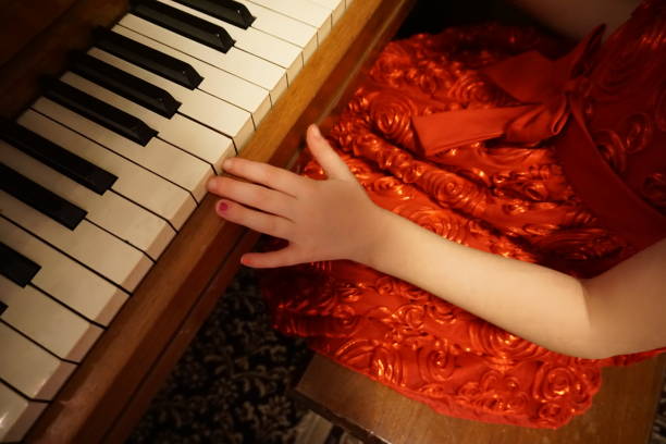 Child Playing Piano at Christmas