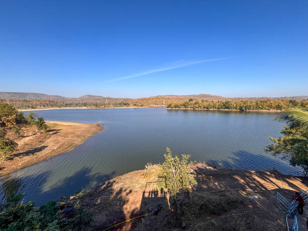 istock A calm lake with a blue sky in the background 2193346190