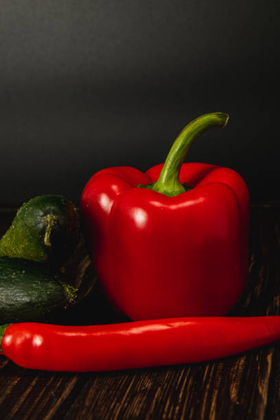 Top view of vegetables on green background in studio photo