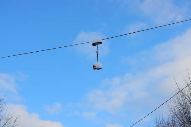 A picturesque cable car station featuring a single gondola set against a stunning and vibrant blue sky above