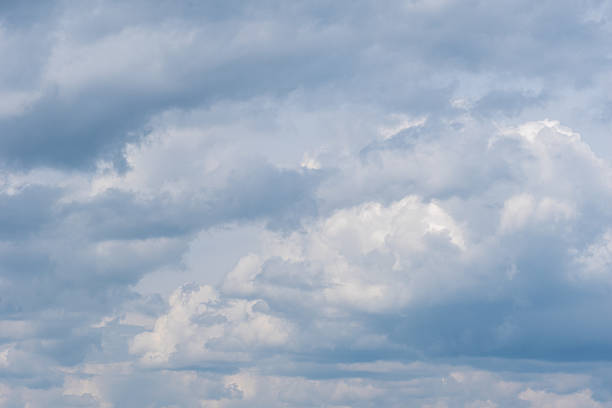 istock Dense gray thunderstorm cumulus wavy clouds in the whole frame. Gloomy rainy Sky background to overlay on your photos 2193355233