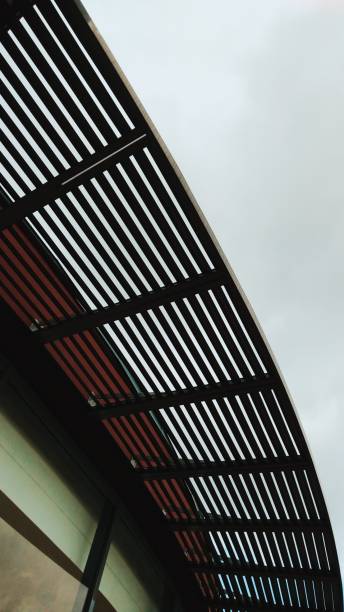 istock Modern Architectural Metal Lattice Structure Against a Contrasting Cloudy Sky 2193357099