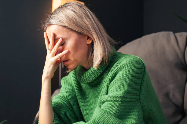 Middle age Sad Woman at Home