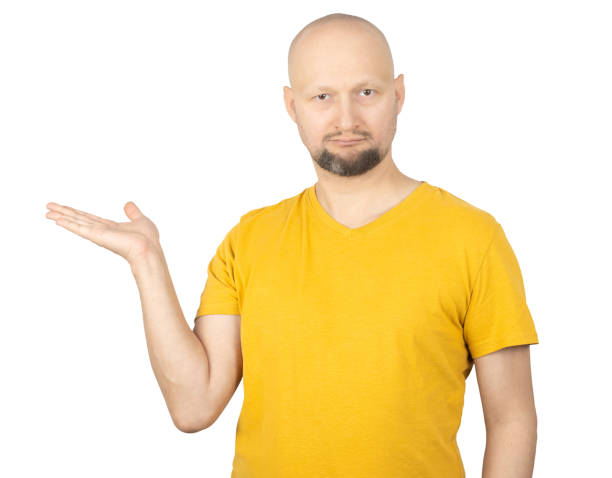 istock Casual Man in Yellow T-Shirt Gesturing with Open Hand 2193363552