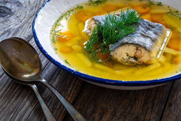 istock Fish soup on wooden table 2193364512