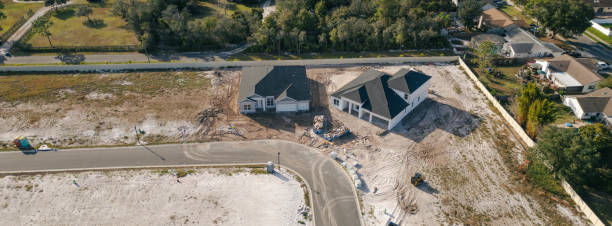 istock New Construction Homes - Orlando Florida - Developing Neighborhood - Two Houses Under Construction 2193364824