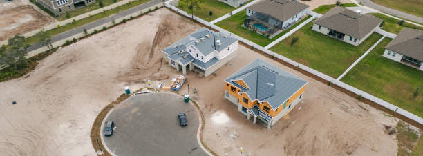 istock New Construction Homes - Orlando Florida - Developing Neighborhood - Two Houses Under Construction 2193364833