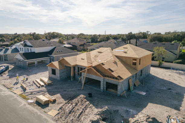 istock New Construction Home - Orlando Florida - Developing Neighborhood - House Under Construction - Roof Added 2193364989