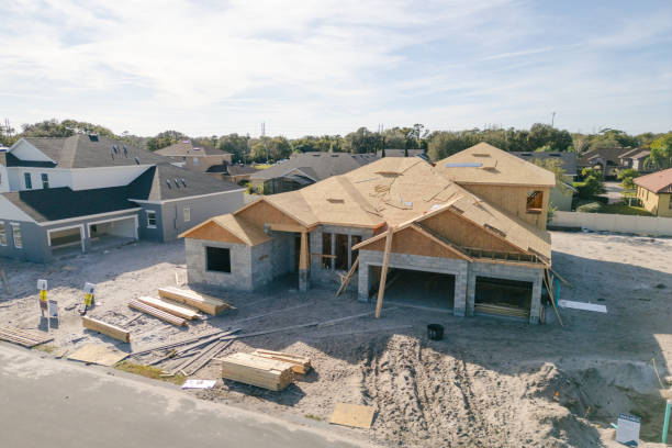 New Construction Home - Orlando Florida - Developing Neighborhood - House Under Construction - Roof Added New Construction Home - Orlando Florida - Developing Neighborhood New Construction stock pictures, royalty-free photos & images