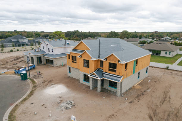 istock New Construction Homes - Orlando Florida - Developing Neighborhood - Two Houses Under Construction 2193365019