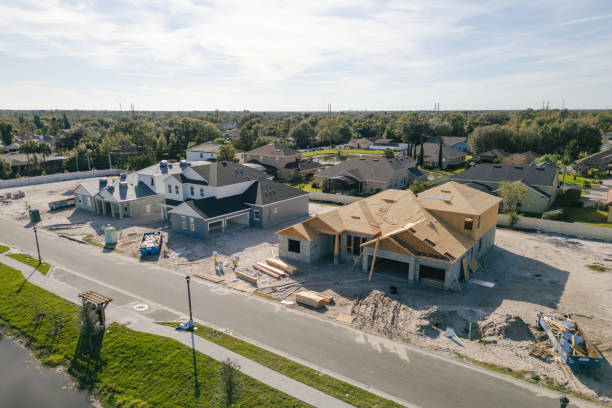 istock New Construction Homes - Orlando Florida - Developing Neighborhood - Three Houses Under Construction 2193365085