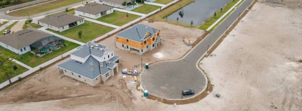 New Construction Homes - Orlando Florida - Developing Neighborhood - Two Houses Under Construction