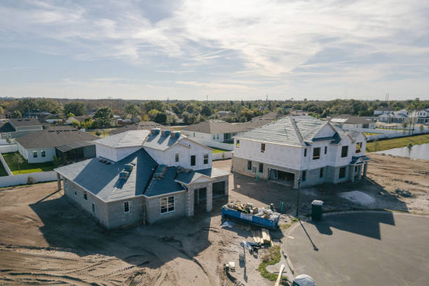 istock New Construction Homes - Orlando Florida - Developing Neighborhood - Two Houses Under Construction 2193365785
