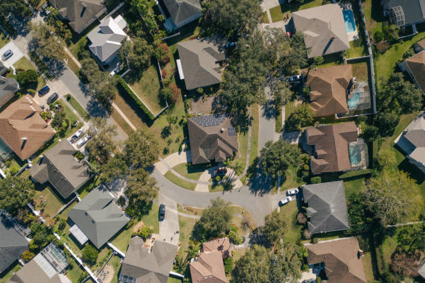 istock Solar Powered Home - Orlando Florida Neighborhood - Top Down - Wide Angle 2193365903