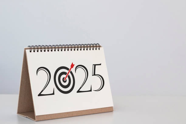 istock 2025 text on blank calendar. 2025 action plan concept 2193366361