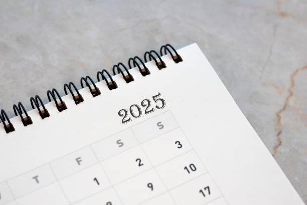 istock Close up of 2025 text on calendar. 2025 target plan concept 2193366373