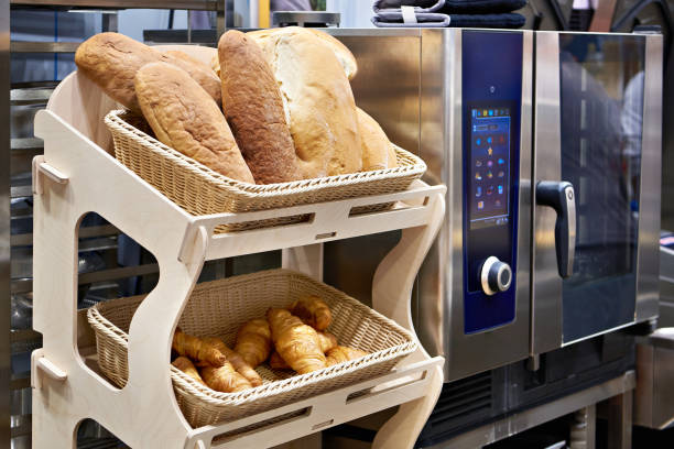 istock Bread and pastries on shelves of bakery 2193366811