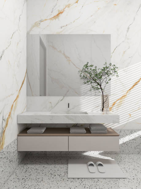 istock A modern minimalist bathroom features a sleek floating vanity with a marble countertop, a large mirror, folded towels. Bathroom 3d rendering mockup. 2193367290