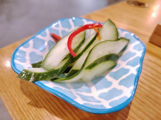 istock Pickle cucumber on a plate in the restaurant 2193370054