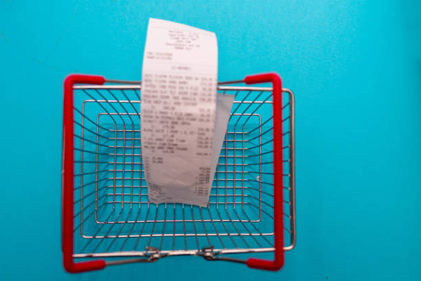 Shopping basket with long receipt.