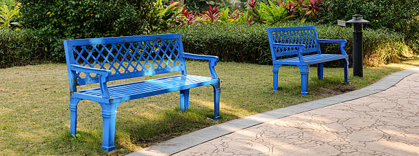 Blue metal benches in the park