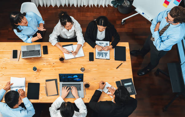 istock Multi ethnic diversity business people and modern business project. Habiliment 2193373957