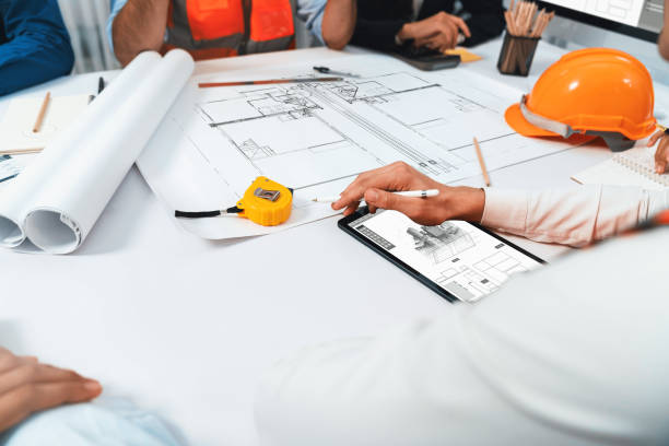 istock Diverse group of civil engineer and client working on architect. Prudent 2193378070
