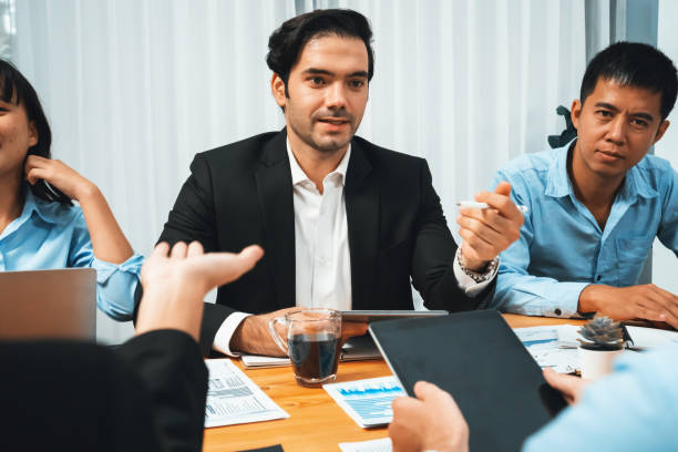 istock Group of business analyst team analyzing financial data report. Habiliment 2193378132