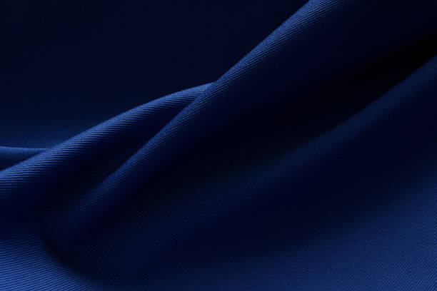 istock The blue fabric is folded. Textile. Banner for advertising goods for creativity. Jeans. 2193378602
