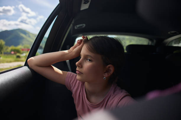 istock Bored girl traveling by car 2193378708