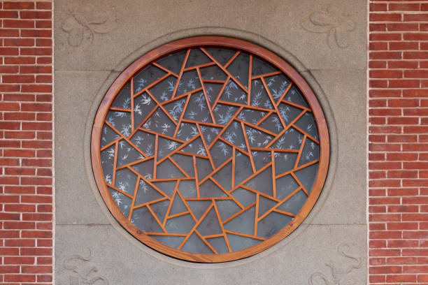 Close up of windows in classical Chinese red brick buildings