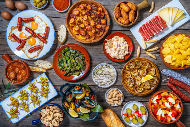 istock Assorted Tapas from Spain food, typical Spanish recipes, and pintxos on a rustic wood 2193379673