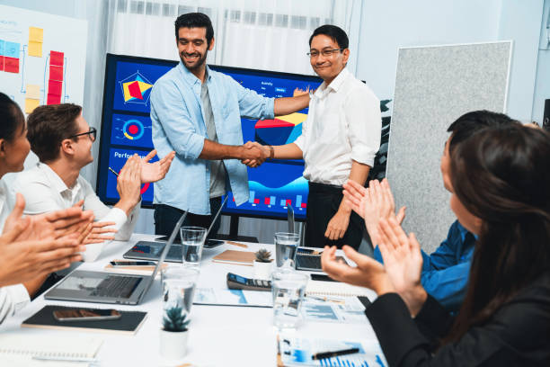 istock Analyst team leader shake hand with colleague after successful meeting. Prudent 2193379986
