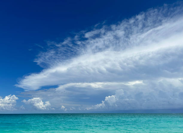 Caribbean Sea with dramatic blue summer sky clouds in Mexico Mayan Riviera