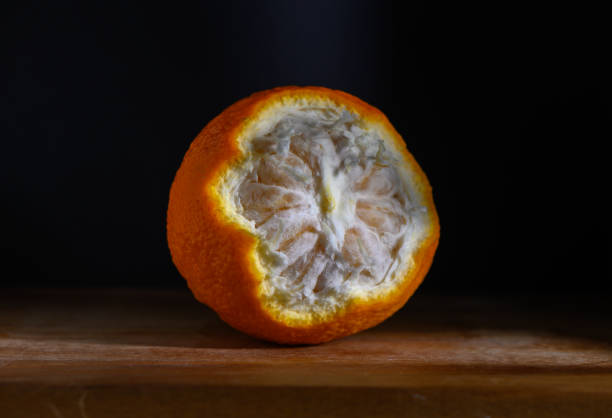 istock Orange reveals its inner beauty with intricate patterns and textures in warm light 2193381216