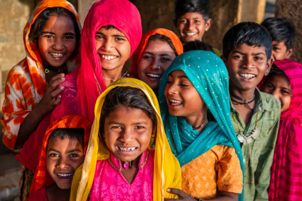 Group of happy Gypsy Indian children, desert village, India Group of happy Gypsy Indian children - desert village, Thar Desert, Rajasthan, India. indian wedding stock pictures, royalty-free photos & images