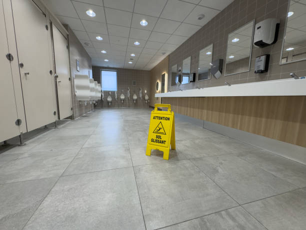 istock Caution sign in a modern restroom highlighting maintenance activity in a well-lit facility 2193383434