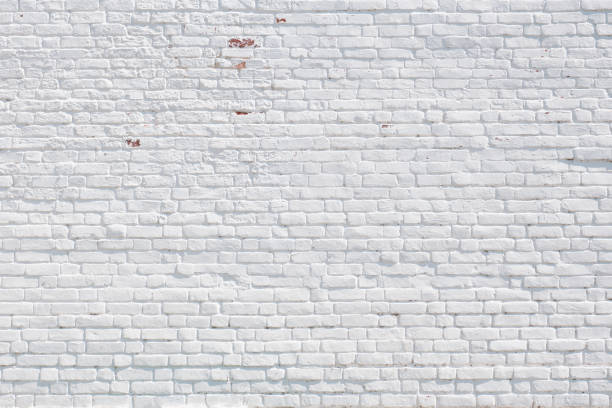 istock Old white painted brick wall of 18th century as historical textured background. 2193385513