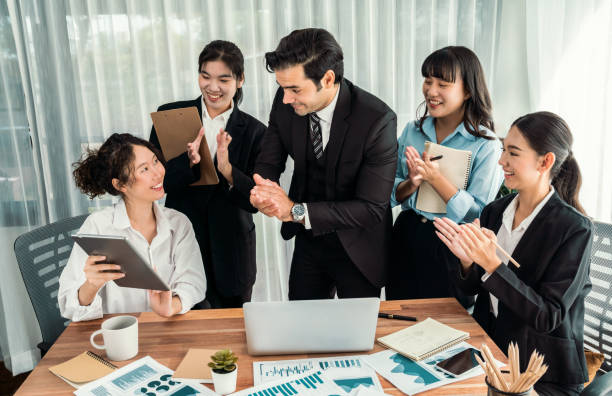 istock Group of business analyst team analyzing financial data report. Habiliment 2193386221