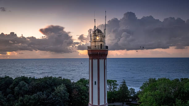 istock Light beam from lighthouse in Poland by Baltic Sea. 2193387445
