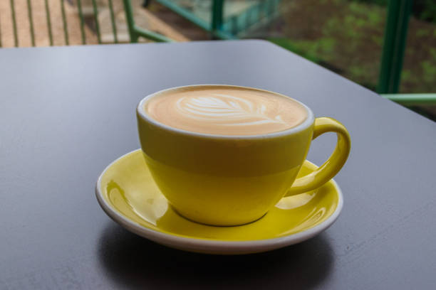 Cup of hot cappuccino coffee on a table