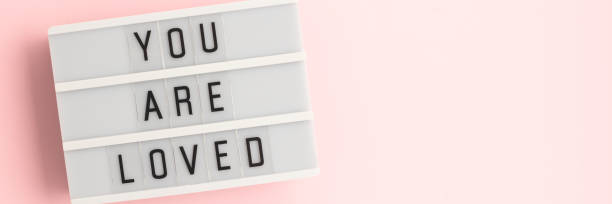 istock You are loved. Lightbox with letters. 2193388952