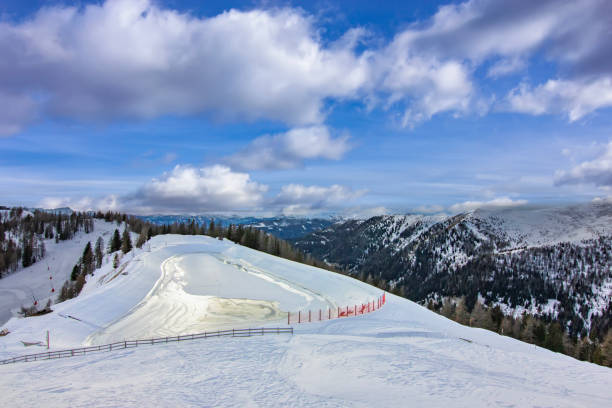 istock Snowy alpine landscape with glacier lake 2193389646
