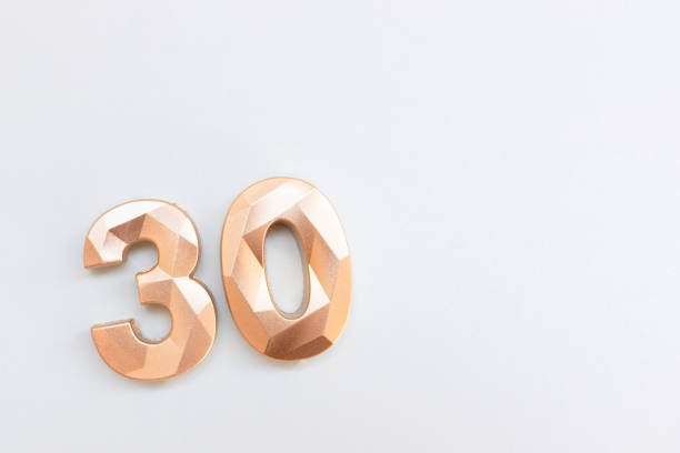 istock Golden number thirty. 2193390960