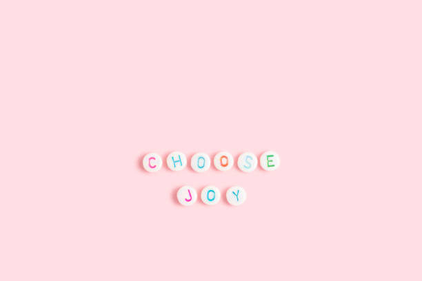istock Quote Choose joy made of round beads with multicolored letters. 2193391480