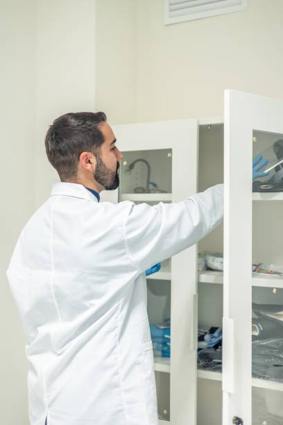 istock Scientist searching for equipment in the laboratory closet 2193391519