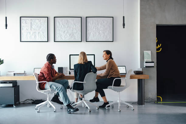 istock Business Team Collaborating in Modern Office Environment 2193393857